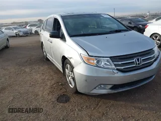 2012 Honda Odyssey Touring with VIN 5FNRL5H96CB095264, listed as a IAAI auction lot 41403450 with 246,199 mi miles. Bid and sale history available at carsss.com. Image 1.