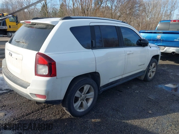2015 Jeep Compass Sport with VIN 1C4NJDBB7FD214669, listed as a IAAI auction lot 41458343 with 146,374 mi miles and . Bid and sale history available at carsss.com. Image 4.