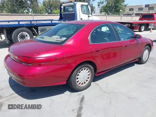 1997 Mercury Sable GS z VIN 1MELM50U6VG651910, wystawiony jako IAAI lot #42494879 z przebiegiem 70 304 mil mil oraz . Historia ofert i sprzedaży dostępna na DreamBid. Obrazek 4.