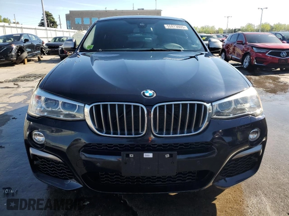 2018 BMW X4 M40i with VIN 5UXXW7C54J0Z44932, listed as a Copart auction lot 55973605 with 101,479 mi miles and Salvage title. Bid and sale history available at DreamBid. Image 5.
