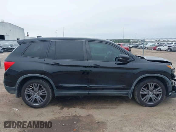 2019 Honda Passport EX-L with VIN 5FNYF7H59KB003011, listed as a IAAI auction lot 41563219 with 78,239 mi miles and . Bid and sale history available at carsss.com. Image 13.