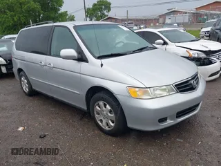 2004 Honda Odyssey EX-RES z VIN 5FNRL18894B144992, wystawiony jako IAAI lot #42181582 z przebiegiem 235 729 mil mil oraz . Historia ofert i sprzedaży dostępna na DreamBid. Obrazek 1.