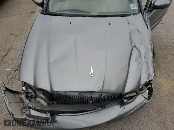 2003 Jaguar X-Type z VIN SAJEB52D33XD54978, wystawiony jako Copart lot #58027805 z przebiegiem Nie podano mil oraz Szkoda całkowita • Salvage title. Historia ofert i sprzedaży dostępna na DreamBid. Obrazek 11.