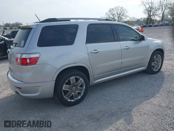 2011 GMC Acadia Denali with VIN 1GKKVTED3BJ297385, listed as a IAAI auction lot 41990548 with 204,333 mi miles. Bid and sale history available at carsss.com. Image 4.
