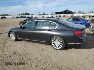2018 BMW 7 Series 740i with VIN WBA7E2C50JG742052, listed as a Copart auction lot 72192053 with 31,946 mi miles and . Bid and sale history available at DreamBid. Image 2.