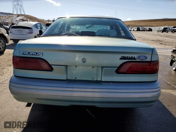 1995 Ford Taurus GL z VIN 1FALP5242SG181625, wystawiony jako Copart lot #81184774 z przebiegiem 107 385 mil mil oraz Szkoda całkowita • Salvage title. Historia ofert i sprzedaży dostępna na DreamBid. Obrazek 6.