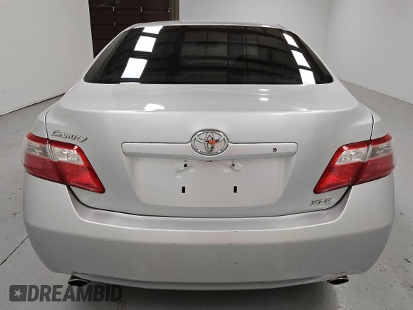 2009 Toyota Camry LE z VIN 4T1BK46K89U595880, wystawiony jako Copart lot #55069935 z przebiegiem 265 831 mil mil oraz Czysty tytuł • Clean title. Historia ofert i sprzedaży dostępna na DreamBid. Obrazek 6.