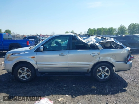 2006 Honda Pilot EX with VIN 5FNYF284X6B035076, listed as a IAAI auction lot 41972090 with 181,279 mi miles and . Bid and sale history available at DreamBid. Image 14.
