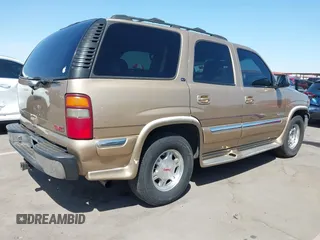 2001 GMC Yukon SLT with VIN 1GKEC13T71J113257, listed as a IAAI auction lot 41975910 with 195,509 mi miles. Bid and sale history available at carsss.com. Image 4.
