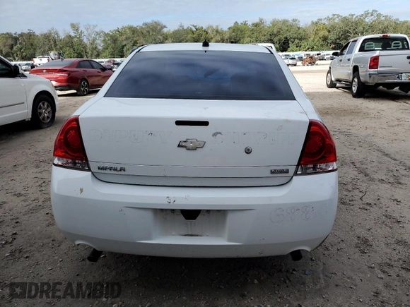 2013 Chevrolet Impala Police with VIN 2G1WD5E34D1106534, listed as a Copart auction lot 79041684 with 133,564 mi miles and Non Repairable. Bid and sale history available at carsss.com. Image 6.