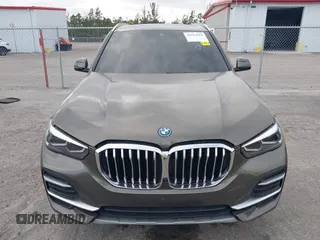 2022 BMW X5 xDrive45e z VIN 5UXTA6C00N9L06383, wystawiony jako IAAI lot #38552162 z przebiegiem 19 592 mil mil oraz . Historia ofert i sprzedaży dostępna na DreamBid. Obrazek 12.