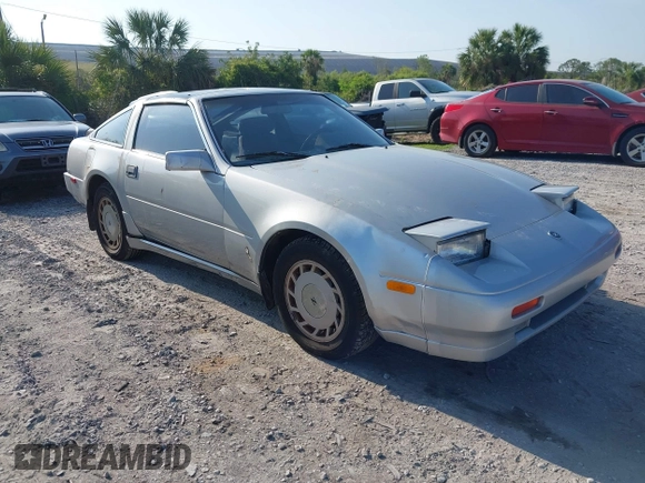 1987 Nissan 300ZX z VIN JN1HZ14S6HX214121, wystawiony jako IAAI lot #42204712 z przebiegiem 218 637 mil mil oraz . Historia ofert i sprzedaży dostępna na DreamBid. Obrazek 1.