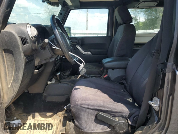 2017 Jeep Wrangler Rubicon with VIN 1C4BJWCG0HL675472, listed as a Copart auction lot 62751365 with 86,338 mi miles and Salvage title. Bid and sale history available at DreamBid. Image 7.