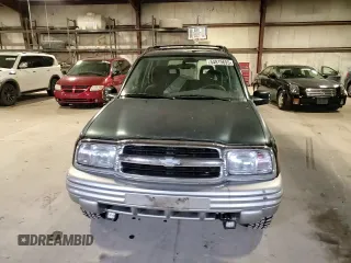 2002 Chevrolet Tracker LT z VIN 2CNBJ634126949974, wystawiony jako Copart lot #54819695 z przebiegiem 200 895 mil mil oraz Szkoda całkowita • Salvage title. Historia ofert i sprzedaży dostępna na DreamBid. Obrazek 15.