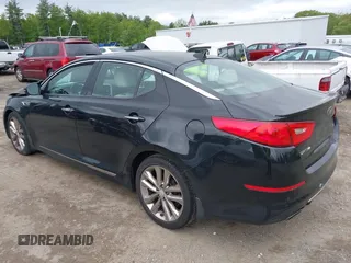 2015 Kia Optima SX Turbo with VIN 5XXGR4A69FG365072, listed as a IAAI auction lot 42295872 with 121,269 mi miles and . Bid and sale history available at DreamBid. Image 3.