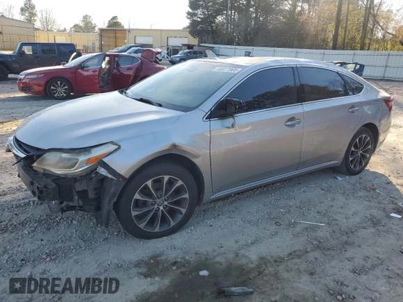 2018 Toyota Avalon XLE with VIN 4T1BK1EB8JU285829, listed as a Copart auction lot 46677905 with 184,542 mi miles and Salvage Title. Bid and sale history available at carsss.com. Image 1.