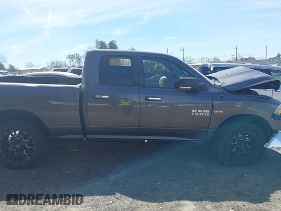 2015 Ram 1500 Big Horn z VIN 1C6RR7GT8FS549293, wystawiony jako IAAI lot #41833000 z przebiegiem Nie podano mil oraz . Historia ofert i sprzedaży dostępna na DreamBid. Obrazek 12.