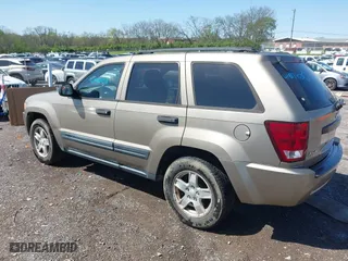 2005 Jeep Grand Cherokee Laredo with VIN 1J4GR48K25C714911, listed as a IAAI auction lot 41987103 with 191,157 mi miles. Bid and sale history available at carsss.com. Image 3.