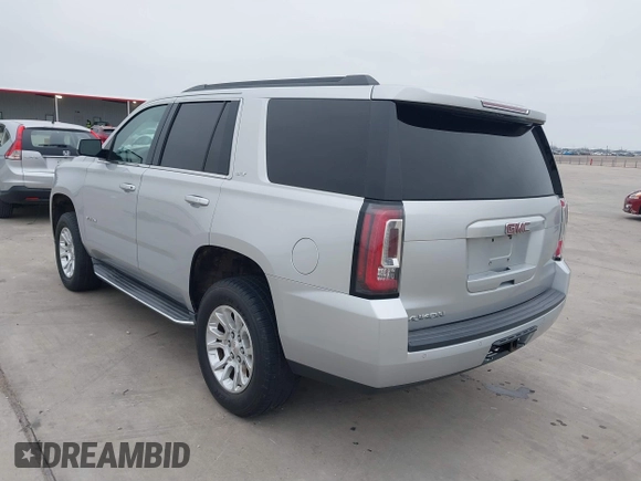 2015 GMC Yukon SLT with VIN 1GKS1BKC3FR253184, listed as a IAAI auction lot 41574610 with 152,543 mi miles. Bid and sale history available at carsss.com. Image 3.