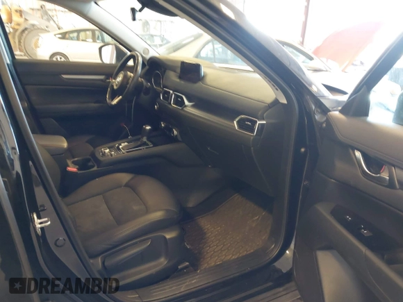 2018 Mazda CX-5 Touring with VIN JM3KFBCM9J0437490, listed as a IAAI auction lot 42006998 with 176,959 mi miles. Bid and sale history available at carsss.com. Image 5.