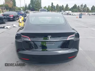 2023 Tesla Model 3 with VIN 5YJ3E1EA5PF647737, listed as a IAAI auction lot 42430145 with 20,525 mi miles and . Bid and sale history available at DreamBid. Image 16.