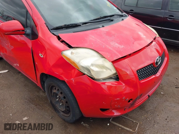 2007 Toyota Yaris with VIN JTDJT923275125859, listed as a IAAI auction lot 42020291 with 179,949 mi miles. Bid and sale history available at carsss.com. Image 6.