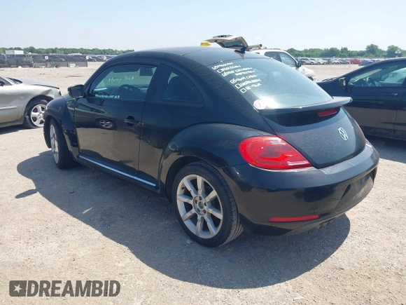 2013 Volkswagen Beetle 2.5L with VIN 3VWHX7AT3DM603962, listed as a IAAI auction lot 42329256 with 137,285 mi miles and . Bid and sale history available at DreamBid. Image 3.