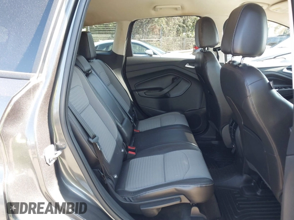 2017 Ford Escape SE with VIN 1FMCU9GD9HUC84906, listed as a IAAI auction lot 41762989 with 147,721 mi miles. Bid and sale history available at carsss.com. Image 8.