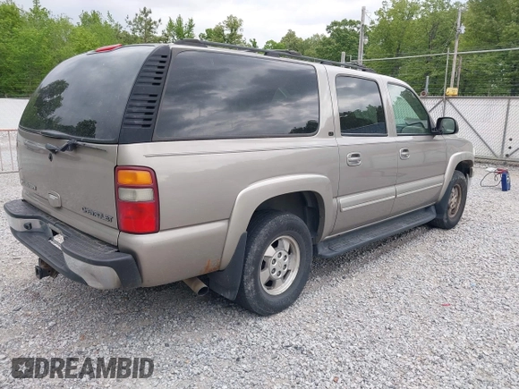 2003 Chevrolet Suburban LT z VIN 1GNEC16Z13J140136, wystawiony jako IAAI lot #42142827 z przebiegiem 252 698 mil mil oraz . Historia ofert i sprzedaży dostępna na DreamBid. Obrazek 4.