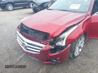 2014 Cadillac ATS Premium z VIN 1G6AE5S33E0125546, wystawiony jako IAAI lot #41989269 z przebiegiem 55 945 mil mil oraz . Historia ofert i sprzedaży dostępna na DreamBid. Obrazek 6.