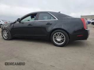 2009 Cadillac CTS RWD w/1SA with VIN 1G6DF577890122363, listed as a Copart auction lot 71401644 with 127,968 mi miles and Salvage Title. Bid and sale history available at carsss.com. Image 2.