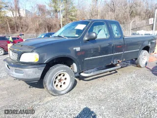 1998 Ford F-150 Standard with VIN 1FTZX18WXWNB87664, listed as a IAAI auction lot 41508340 with 276,281 mi miles. Bid and sale history available at carsss.com. Image 2.