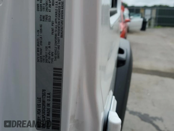 2024 Jeep Wrangler Sport S with VIN 1C4PJXDG3RW173078, listed as a Copart auction lot 57075565 with 26,661 mi miles and Salvage title. Bid and sale history available at DreamBid. Image 13.