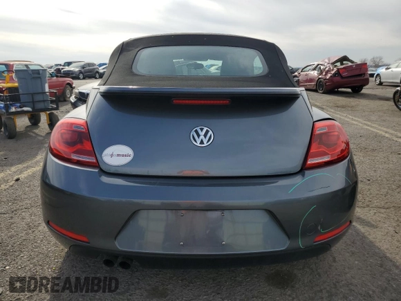 2015 Volkswagen Beetle 1.8T w/Tech with VIN 3VW517AT5FM812045, listed as a Copart auction lot 49538615 with Not Provided miles and Salvage Title. Bid and sale history available at DreamBid. Image 6.