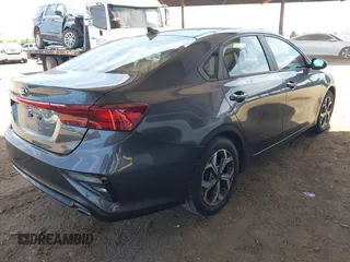 2021 Kia Forte LXS z VIN 3KPF24AD7ME294409, wystawiony jako IAAI lot #42124606 z przebiegiem 91 567 mil mil oraz . Historia ofert i sprzedaży dostępna na DreamBid. Obrazek 4.