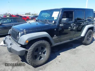 2008 Jeep Wrangler Unlimited Rubicon with VIN 1J8GA69108L574773, listed as a IAAI auction lot 42714300 with 106,974 mi miles and . Bid and sale history available at DreamBid. Image 17.