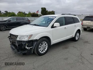 2015 Dodge Journey SXT z VIN 3C4PDCBGXFT743372, wystawiony jako Copart lot #65270895 z przebiegiem 119 593 mil mil oraz Szkoda całkowita • Salvage title. Historia ofert i sprzedaży dostępna na DreamBid. Obrazek 1.