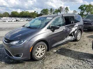2020 Chrysler Pacifica Touring L with VIN 2C4RC1BG1LR284506, listed as a Copart auction lot 51513115 with 86,965 mi miles and Salvage title. Bid and sale history available at DreamBid. Image 1.