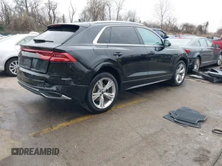2023 Audi Q8 Premium with VIN WA1AVBF19PD019841, listed as a IAAI auction lot 40827495 with 29,033 mi miles and . Bid and sale history available at DreamBid. Image 4.