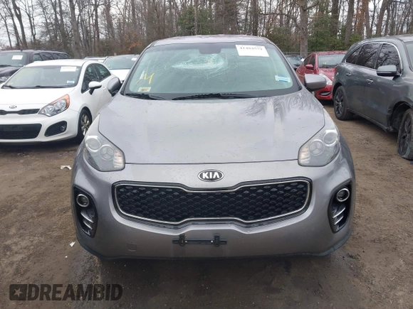 2018 Kia Sportage LX with VIN KNDPMCAC7J7393243, listed as a IAAI auction lot 41484579 with 122,022 mi miles. Bid and sale history available at carsss.com. Image 12.