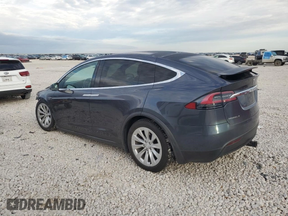 2016 Tesla Model X 70D with VIN 5YJXCAE22GF002253, listed as a Copart auction lot 50700425 with 153,258 mi miles and Salvage Title. Bid and sale history available at carsss.com. Image 2.
