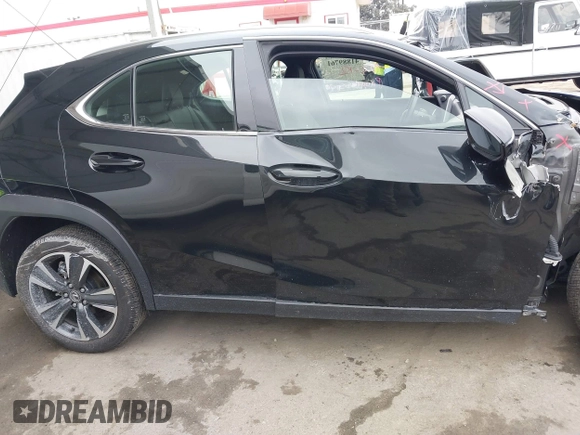 2025 Lexus UX with VIN JTHYBJAH9S2002181, listed as a IAAI auction lot 41889761 with 5,278 mi miles and . Bid and sale history available at DreamBid. Image 14.