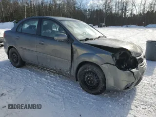 2011 Kia Rio with VIN KNADH4B32B6915325, listed as a Copart auction lot 86824074 with 167,410 mi miles and Salvage Title. Bid and sale history available at DreamBid. Image 4.