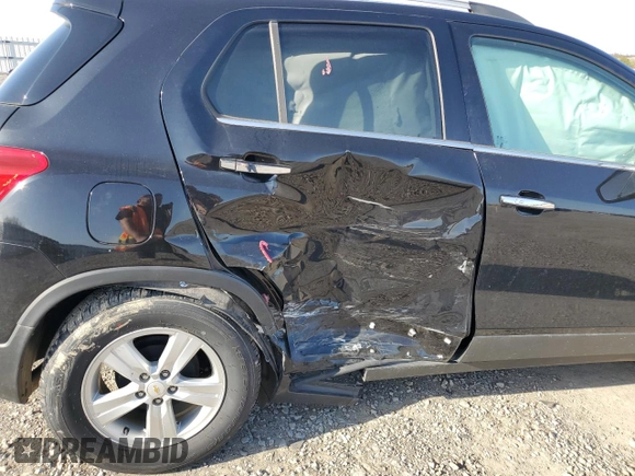 2020 Chevrolet Trax LT z VIN KL7CJLSBXLB026072, wystawiony jako Copart lot #52309265 z przebiegiem Nie podano mil oraz Szkoda całkowita • Salvage title. Historia ofert i sprzedaży dostępna na DreamBid. Obrazek 11.