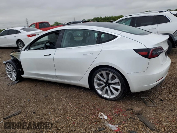 2020 Tesla Model 3 Long Range z VIN 5YJ3E1EB3LF667522, wystawiony jako Copart lot #57421145 z przebiegiem 77 821 mil mil oraz Szkoda całkowita • Salvage title. Historia ofert i sprzedaży dostępna na DreamBid. Obrazek 2.