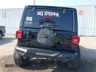 2020 Jeep Wrangler Unlimited Sahara with VIN 1C4HJXEG6LW211932, listed as a IAAI auction lot 42040546 with 74,732 mi miles and . Bid and sale history available at DreamBid. Image 17.