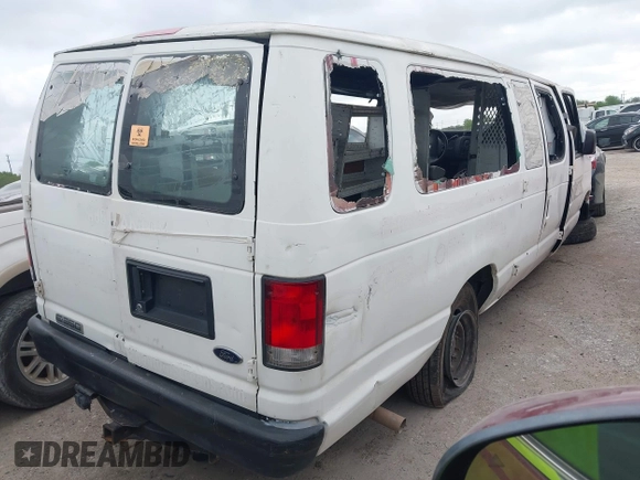 2014 Ford Econoline Wagon XL with VIN 1FBSS3BLXEDA71562, listed as a IAAI auction lot 41864794 with 140,942 mi miles. Bid and sale history available at carsss.com. Image 4.