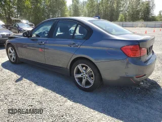 2014 BMW 3 Series 320i with VIN WBA3B1C54EK132952, listed as a Copart auction lot 63653435 with 63,260 mi miles and Salvage title. Bid and sale history available at DreamBid. Image 2.
