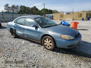 2005 Ford Taurus SEL with VIN 1FAFP56215A234943, listed as a Copart auction lot 51486595 with 222,307 mi miles and Salvage Title. Bid and sale history available at DreamBid. Image 4.