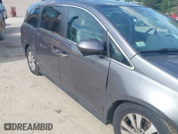 2015 Honda Odyssey EX-L z VIN 5FNRL5H69FB060423, wystawiony jako IAAI lot #42335707 z przebiegiem 175 770 mil mil oraz . Historia ofert i sprzedaży dostępna na DreamBid. Obrazek 6.